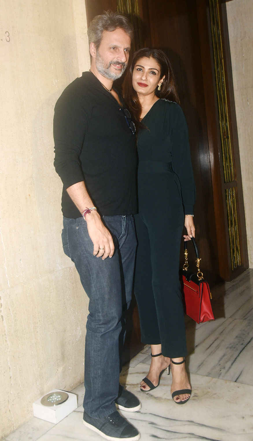Anil Thadani and Raveena Tandon poses for photographers during Manish Malhotra's birthday party. Aditi Rao Hydari,Anil Thadani,Raveena Tandon,Huma Qureshi,Karan Johar,Sonakshi Sinha,Sophie Choudry,Manish Malhotra's Birthday Bash,Manish Malhotra Birthday Bash,celebs at Manish Malhotra Birthday Bash