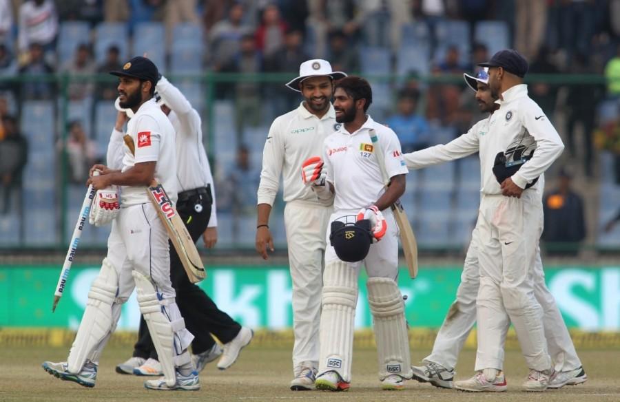 Despite losing his partners, the 26-year-old de Silva battled a glute muscle injury to complete his career's third Test century from 188 balls and later added an unbeaten 58-run stand for the sixth wicket in the company of Roshen. The centurion was however, forced to walk off just before the tea break which saw stumper Niroshan Dickwella joining Roshen in the middle. Roshen, who got a duck in the first innings made up for his flop show, showing great maturity to bring up his maiden half century off 105 balls. Dickwella, at the other end played his aggressive natural game, slamming six boundaries in his 66-ball unbeaten knock. India vs Sri Lanka,India vs Sri Lanka 2017,India vs Sri Lanka 3rd Test,India record