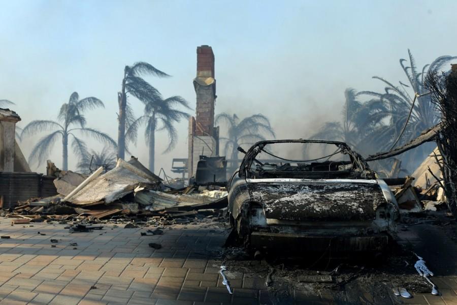 The remains of a home are seen, after it burned to the ground, during a wind-driven wildfire in Ventura, California, U.S. Wildfire,California wildfire,Los Angeles