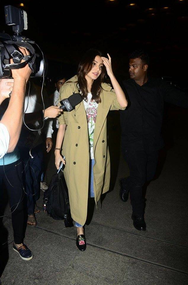 Bollywood Actress Anushka Sharma and her family members were dogged by questions on rumours about her wedding to star cricketer Virat Kohli as they made their way into the airport here to take off reportedly for Italy. Anushka Sharma,Ajay Kumar Sharma,Anushka Sharma and Virat Kohli's wedding,Anushka Sharma and Virat Kohli's marriage,Anushka Sharma and Virat Kohli,Virat Kohli