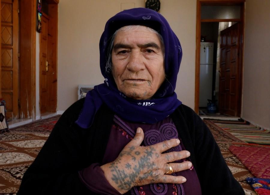 Senem Dogru, 80, poses as she speaks about her tattoos at her home in Kisas village in southeastern province of Sanliurfa, Turkey. Tattooed women,Ayse Yusufoglu,Turkey women