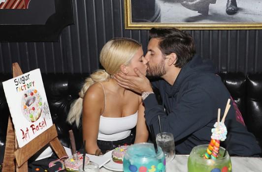 Scott Disick and Sofia Richie lock lips in Miami at the Sugar Factory.
