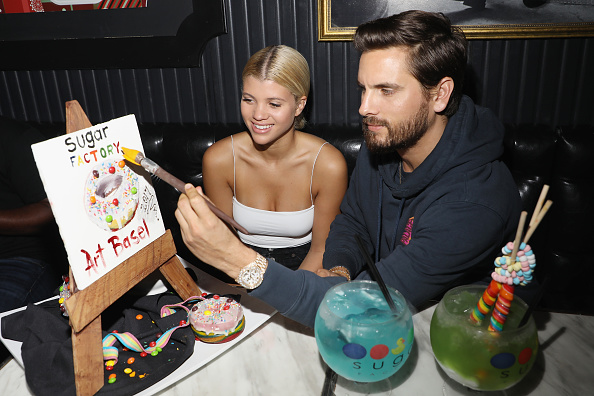Sofia Richie and Scott Disick are seen during Art Week Party at Sugar Factory American Brasserie on December 8, 2017 in Miami, Florida. Scott Disick and Sofia Richie,Scott Disick and Sofia Richie lip lock,Scott Disick and Sofia Richie lip lock pics,Scott Disick and Sofia Richie kissing,Scott Disick and Sofia Richie lip lock images,Scott Disick and Sofia Richie lip lock stills,Scott Disick