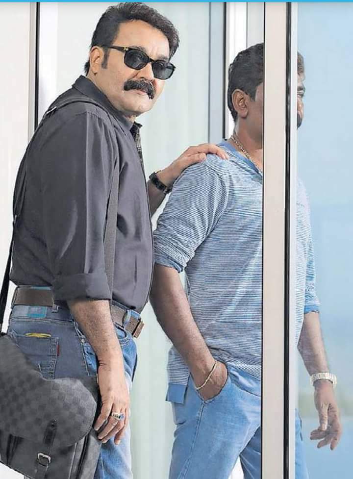 Mohanlal after losing weight following a crash diet and fitness regime to look young for Odiyan. Directed by Shrikumar Menon. Odiyan,Mohanlal,actor Mohanlal,mohanlal upcoming films,Mohanlal in Odiyann,Odiyan first look,Odiyan first look poster,Odiyan poster