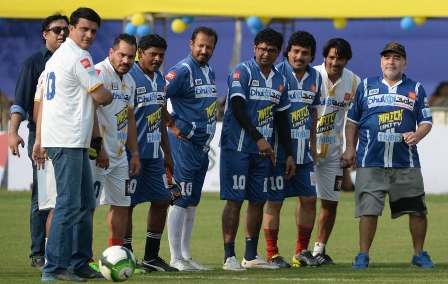 Argentine football legend Diego Maradona, Cricket Association of Bengal (CAB) president Sourav Ganguly and other footballers during a sports workshop in Barasat, West Bengal on Dec 12, 2017. Diego Maradona,Sourav Ganguly,Diego Maradona and Sourav Ganguly