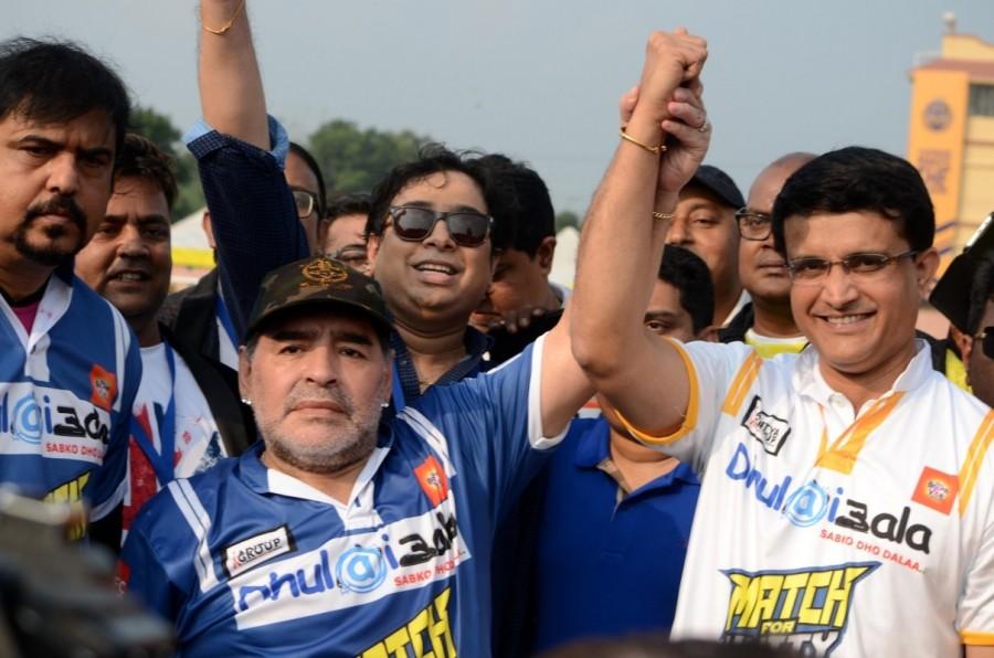 Argentine football legend Diego Maradona with Cricket Association of Bengal (CAB) president Sourav Ganguly during a sports workshop in Barasat, West Bengal on Dec 12, 2017. Diego Maradona,Sourav Ganguly,Diego Maradona and Sourav Ganguly
