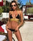 Ukrainian model Alina Baikova flaunts her incredible figure in skimpy thong bikini.