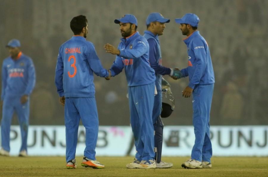 Leg-spinner Yuzvendra Chahal was the pick of the Indian bowlers, returning with 3/60 after skipper Rohit Sharma's historic third ODI double ton powered the hosts to a huge 392/4. India vs Sri Lanka 2nd ODI,India vs Sri Lanka,India vs Sri Lanka 2017,Rohit Sharma,Rohit Sharma third ODI double,Rohit Sharma double hundred
