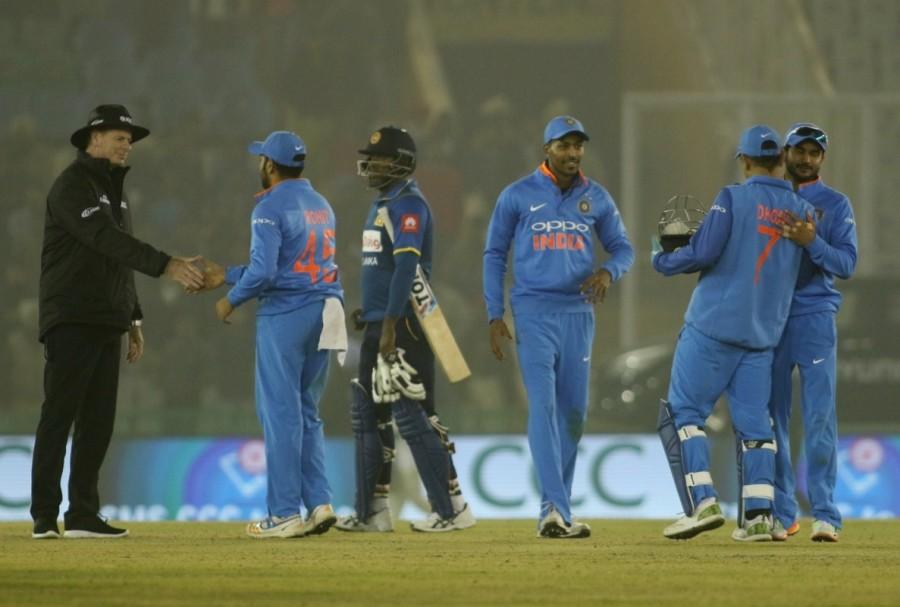 Indian players celebrate after winning the second One Day International (ODI) match against Sri Lanka at Punjab Cricket Association IS Bindra Stadium. India vs Sri Lanka 2nd ODI,India vs Sri Lanka,India vs Sri Lanka 2017,Rohit Sharma,Rohit Sharma third ODI double,Rohit Sharma double hundred