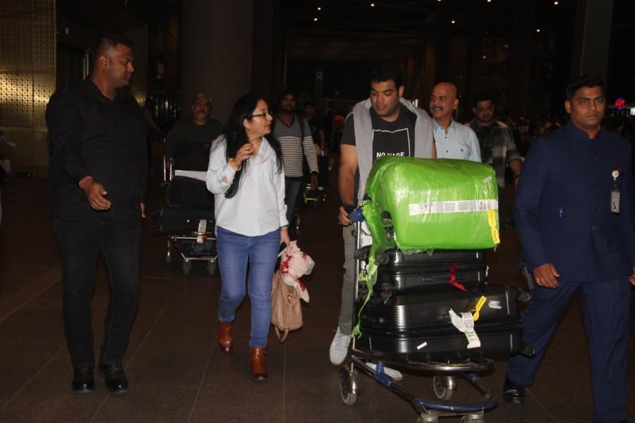 Ajay Kumar Sharma, Ashima and Ajay Kumar spotted at Mumbai Airport. Anushka Sharma,Anushka Sharma family,Anushka Sharma returns Mumbai,Anushka Sharma and Virat Kohli,Anushka Sharma and Virat Kohli wedding,Anushka Sharma and Virat Kohli marriage