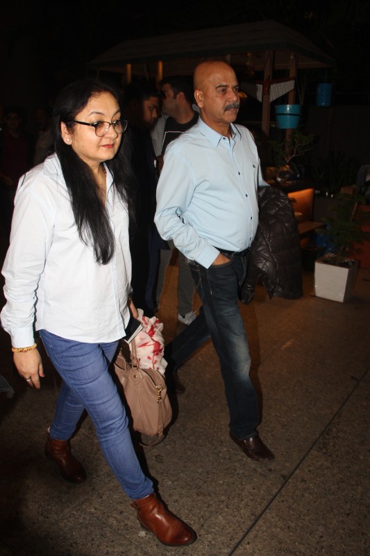 Ajay Kumar Sharma and Ashima spotted at Mumbai Airport. Anushka Sharma,Anushka Sharma family,Anushka Sharma returns Mumbai,Anushka Sharma and Virat Kohli,Anushka Sharma and Virat Kohli wedding,Anushka Sharma and Virat Kohli marriage