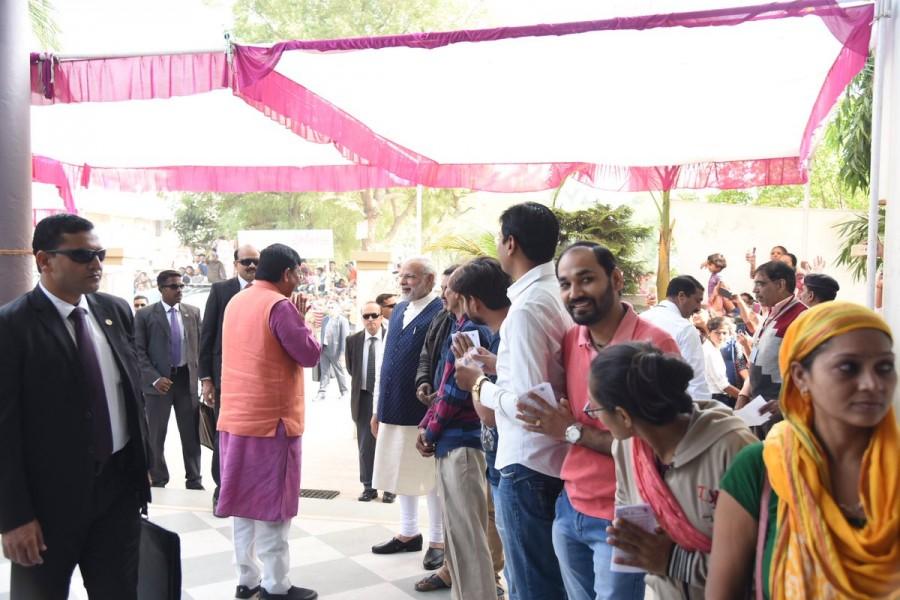 Modi stood in a queue along with other voters at the Nishan High School in the Sabarmati area. While in the queue, he was seen interacting with other voters. Gujarat Assembly elections,Gujarat Assembly elections second phase,gujarat assembly elections 2017,Narendra Modi casts his vote,Narendra Modi,PM Narendra Modi,Modi casts vote,Modi casts vote in Gujarat polls,INS Kalvari