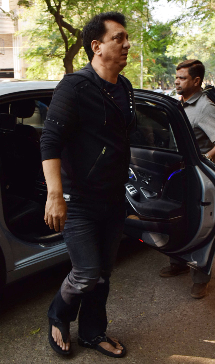 Sajid Nadiadwala arrives to pay his last respects to Neeraj Vora during his funeral procession, in Mumbai on December 14, 2017. Abhishek Bachchan,Sunil Pal,Sushant Singh,Bunty Walia,Sajid Nadiadwala,Rohit Shetty,Rajpal Yadav,Neeraj Vora's funeral,Neeraj Vora funeral,Neeraj Vora funeral pics,Neeraj Vora funeral images,Neeraj Vora funeral stills