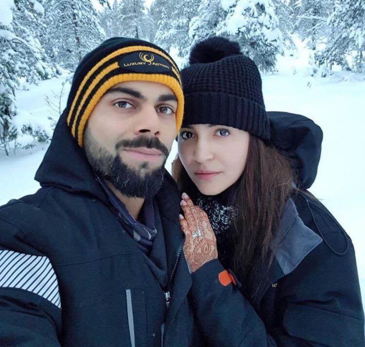 Anushka on Friday shared a cosy selfie with Virat, and the white landscape makes the perfect backdrop. "In heaven, literally," Anushka captioned the image, without divulging the destination they are in. Virat and Anushka's nuptials were a close family affair in Tuscany, Italy on December 11. It was a hush-hush affair at a luxury heritage resort Borgo Finocchieto, a little over 100 km away from Florence. On the acting front, Anushka will next be seen in "Sui Dhaaga - Made in India", while Virat will join the team for the South Africa series which starts from December 30. Virat Kohli and Anushka Sharma,Virat Kohli,Anushka Sharma,Virat Kohli and Anushka Sharma honeymoon,Virat Kohli honeymoon,Anushka Sharma honeymoon,Virat Kohli and Anushka Sharma honeymoon pics,Virat Kohli and Anushka Sharma honeymoon images,Virat Kohli and