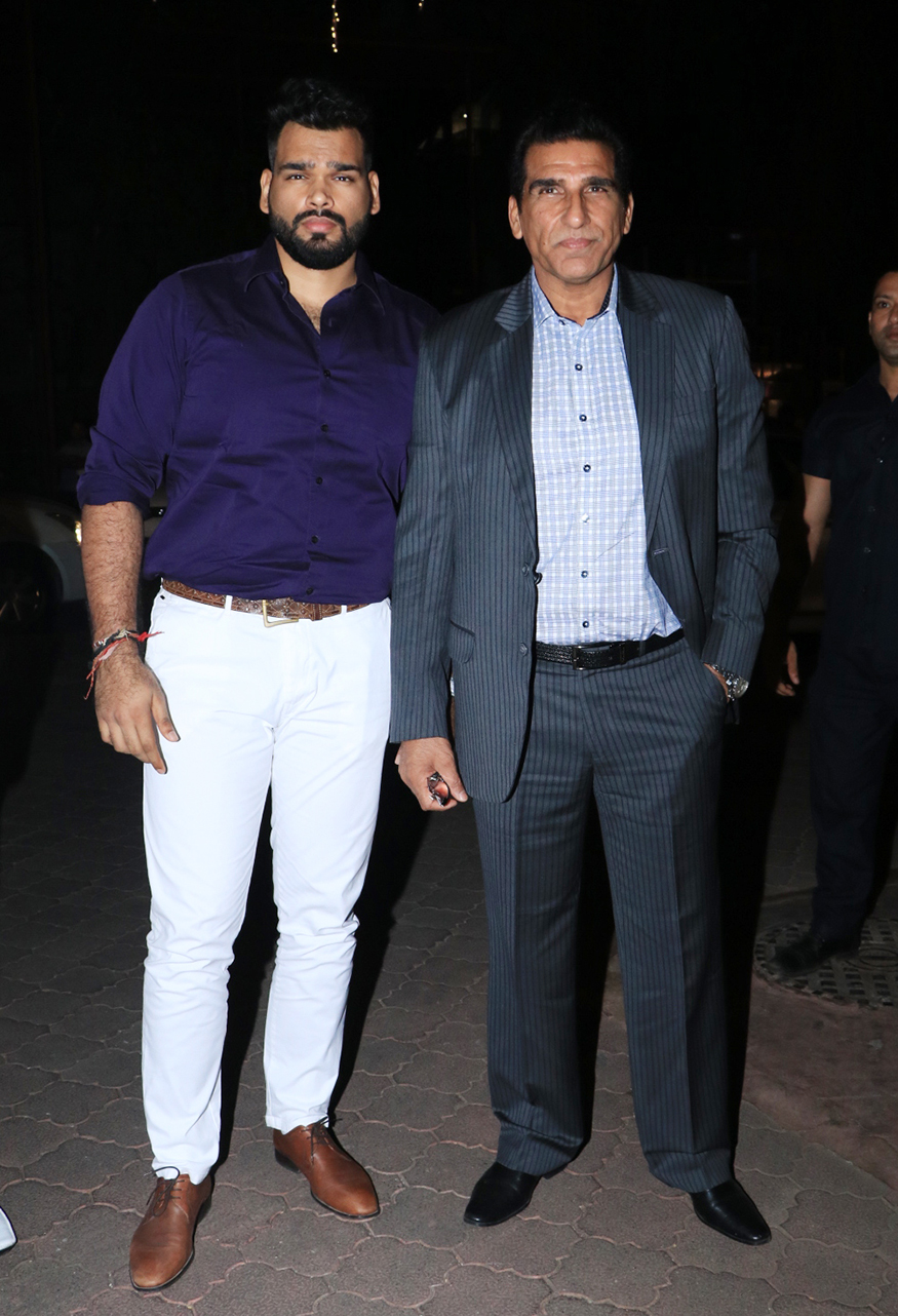 Mukesh Rishi poses with his son at Prem Chopra celebrates 60 Years in Film Industry. Prem Chopra,Prem Chopra 60 years,Veteran actor Prem Chopra,Jeetendra,Rakesh Roshan,Sharman Joshi