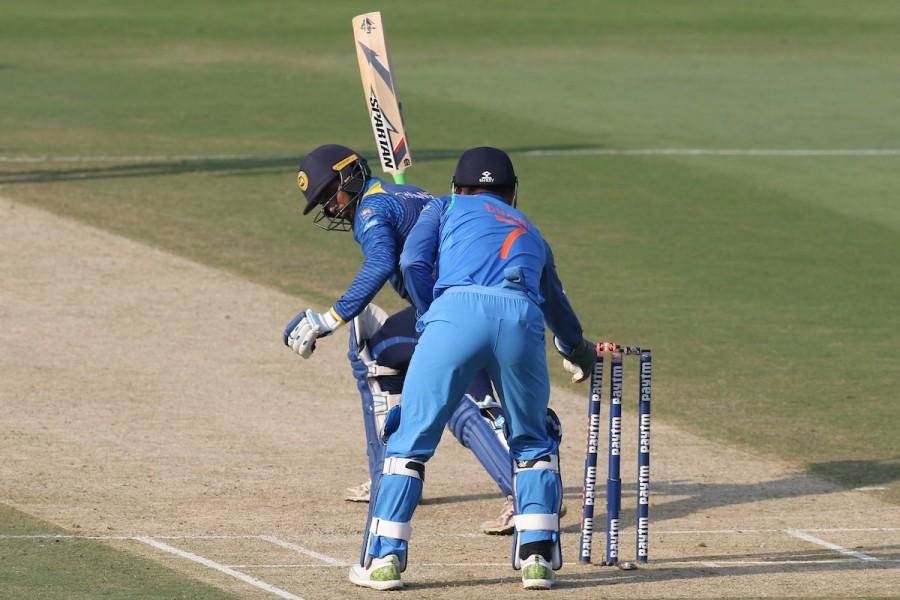 However, the visitors staged a strong comeback with Upul Tharanga and Sadeera Samarawickrama adding 121 runs between them. The two of them batted comfortably to set Sri Lanka up for a big total. Tharanga took a particular liking to Hardik Pandya, smashing the pacer for five consecutive boundaries in the ninth over. But just when it seemed that the duo might help the visitors run away with the game, Yuzvendra Chahal removed Samarawickrama to give India a much needed breakthrough. Shikhar Dhawan,India vs Sri Lanka,India beats Sri Lanka,India trash Sri Lanka,Dinesh Karthik,Mahendra Singh Dhoni