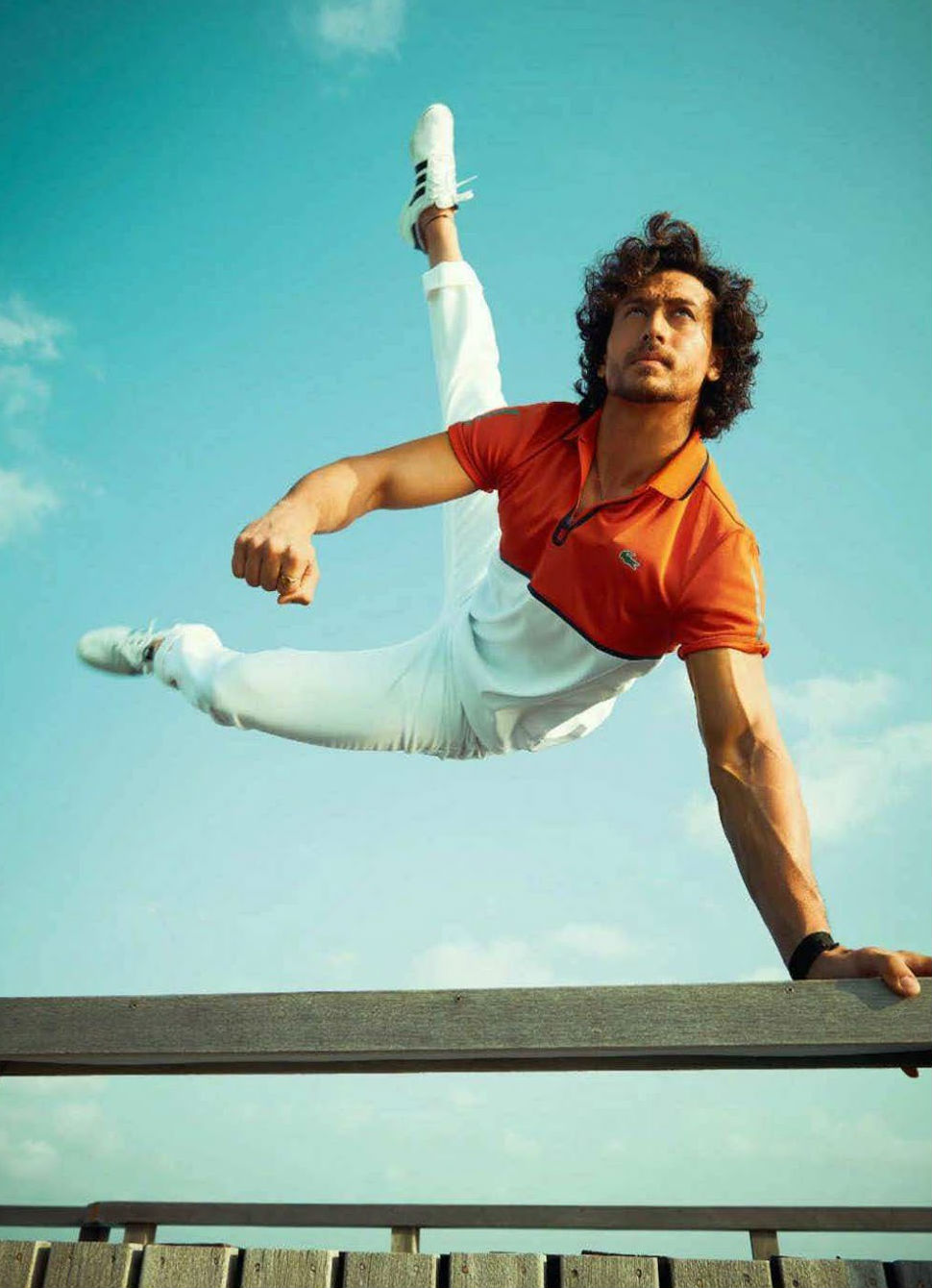 Tiger is someone who’s always synonymous with Action and Fitness. Here we see him in his action avatar doing a 90 degree and posing in utmost perfection Tiger Shroff,actor Tiger Shroff,hot Tiger Shroff,Tiger Shroff on GQ,GQ magazine
