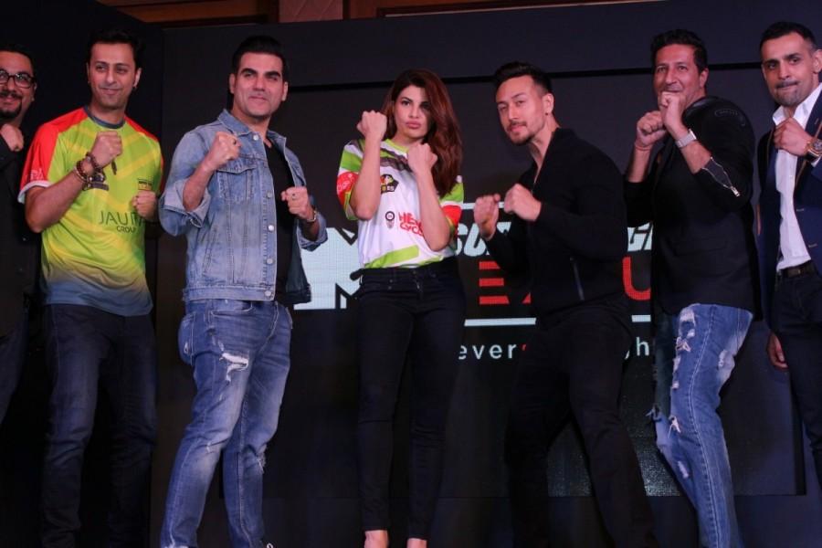 Actors Jacqueline Fernandez and Tiger Shroff, music composer duo Salim Merchant and Sulaiman Merchant at the launch of "Super Fight League Season 2" in Mumbai on Dec 18, 2017. Jacqueline Fernandez,Tiger Shroff,Salim Merchant and Sulaiman Merchant,Super Fight League Season 2 launch,Super Fight League Season 2,Super Fight League