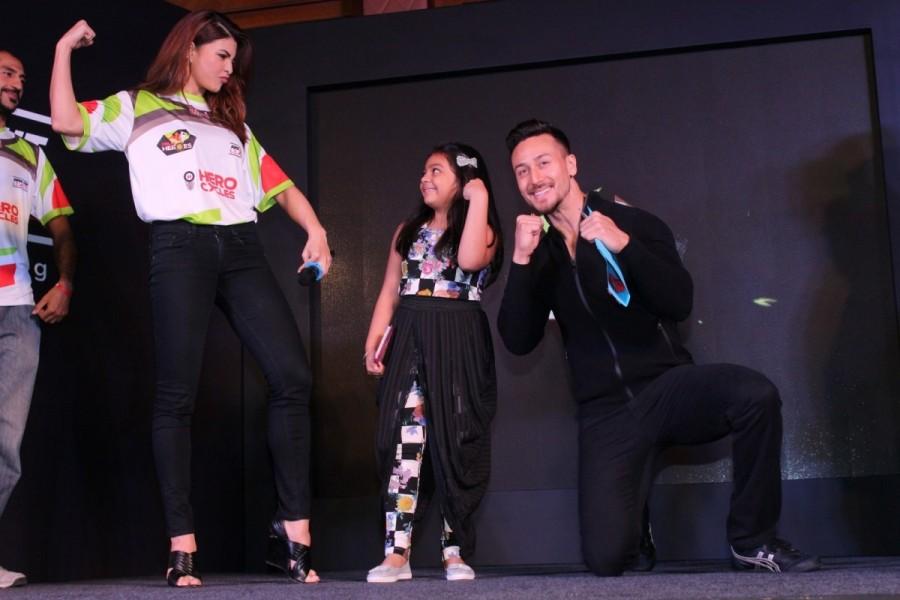 Jacqueline Fernandez and Tiger Shroff at the launch of "Super Fight League Season 2" in Mumbai. Jacqueline Fernandez,Tiger Shroff,Salim Merchant and Sulaiman Merchant,Super Fight League Season 2 launch,Super Fight League Season 2,Super Fight League