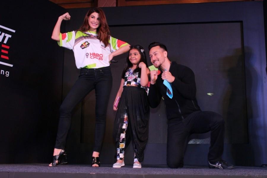Actors Jacqueline Fernandez and Tiger Shroff at the launch of "Super Fight League Season 2" in Mumbai on Dec 18, 2017. Jacqueline Fernandez,Tiger Shroff,Salim Merchant and Sulaiman Merchant,Super Fight League Season 2 launch,Super Fight League Season 2,Super Fight League