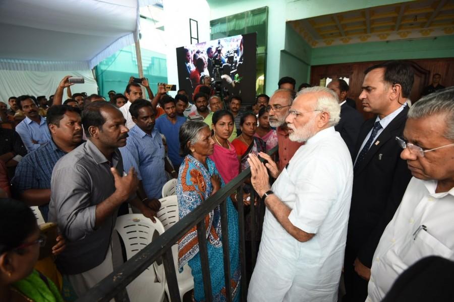 Modi arrived at the Poonthura Community hall to interact directly with the families of the fisherfolk whose near and dear ones either died or remain missing, giving them a patient hearing as Union Tourism and IT Minister K.J. Alphons translated what they were saying. It was after that the Prime Minister went on to the stage and spoke briefly. PM Narendra Modi,Narendra Modi,Modi visits cyclone-hit TN,Modi visits cyclone-hit,Lakshadweep