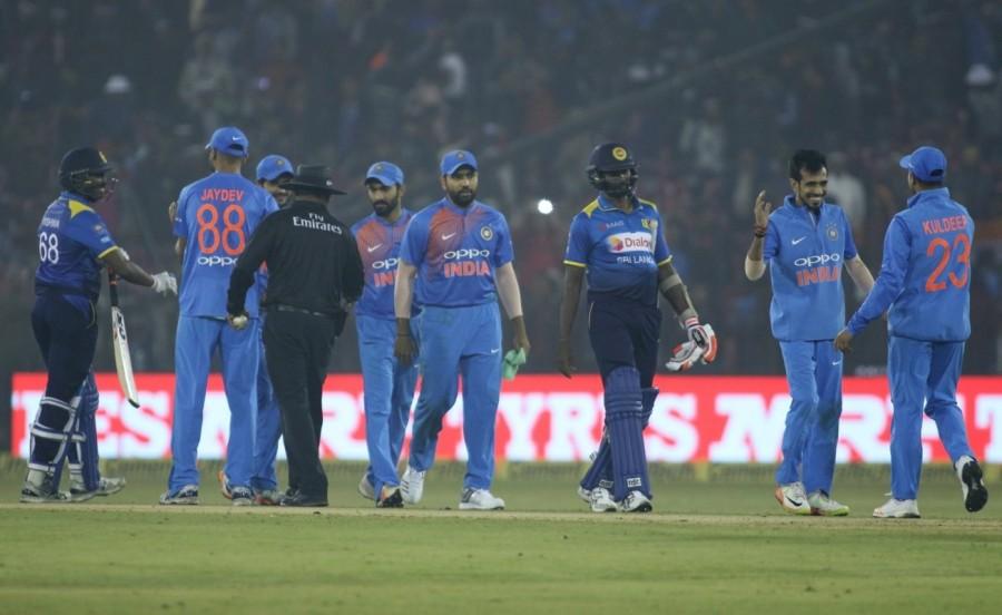 India put up a strong all-round show to register their biggest Twenty20 International (T20I) win in terms of runs -- 93 -- in the first match against Sri Lanka at the Barabati Stadium here on Wednesday. Opener Lokesh Rahul (61) played sensibly at the top order before Mahendra Singh Dhoni (39 not out) and Manish Pandey (32 not out) finished off the proceedings in style to take India to 180/3. India vs Sri Lanka,India vs Sri Lanka 1st T20,India beats Sri Lanka,India trash Sri Lanka,Lokesh Rahul,Mahendra Singh Dhoni,Dhoni