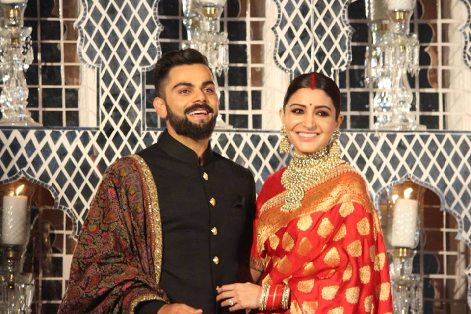 Virat Kohli and Anushka Sharma on stage for post-wedding reception ...