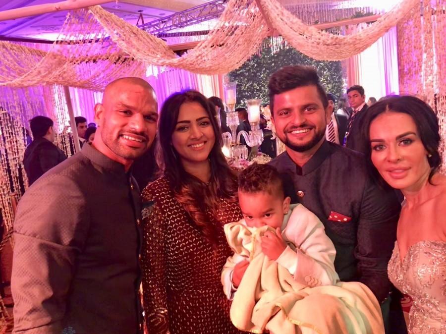 The reception was mainly attended by the family members and close relatives and friends of the couple amid high security. Police had blocking approach roads to the venue, especially for Modi and Jaitley's arrival. Suresh Raina,Shikhar Dhawan,Virat Kohli and Anushka Sharma wedding reception,Virat Kohli wedding reception,Anushka Sharma wedding reception