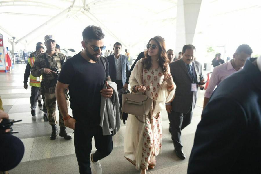 The reception in Delhi will be followed by another reception in Mumbai, where various cricketers and members of the film fraternity are expected to grace the red carpet. Virat Kohli and Anushka Sharma,Virat Kohli,Anushka Sharma,Virat Kohli at Delhi airport,Anushka Sharma spotted at Delhi airport,Virat Kohli spotted at Delhi airport,Virat Kohli and Anushka Sharma reception,Virat Kohli and Anushka Sharma reception pics,Vira