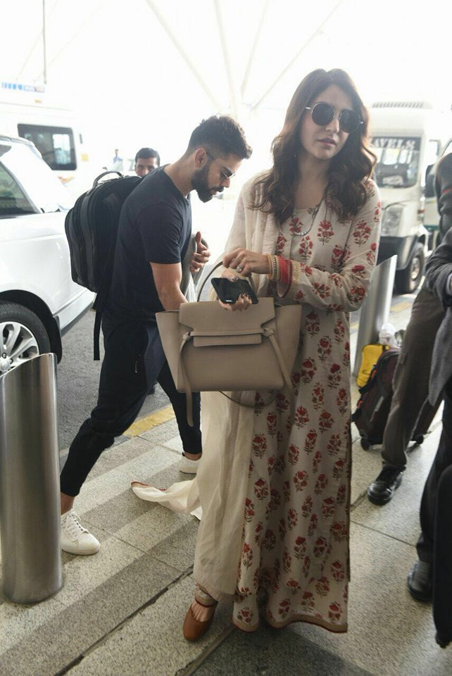 After celebrating the New Year together, Virat will soon fly to South Africa for the upcoming series, while Anushka will begin shooting for Anand L. Rai's yet-to-be-titled film with Shah Rukh Khan. Virat Kohli and Anushka Sharma,Virat Kohli,Anushka Sharma,Virat Kohli at Delhi airport,Anushka Sharma spotted at Delhi airport,Virat Kohli spotted at Delhi airport,Virat Kohli and Anushka Sharma reception,Virat Kohli and Anushka Sharma reception pics,Vira