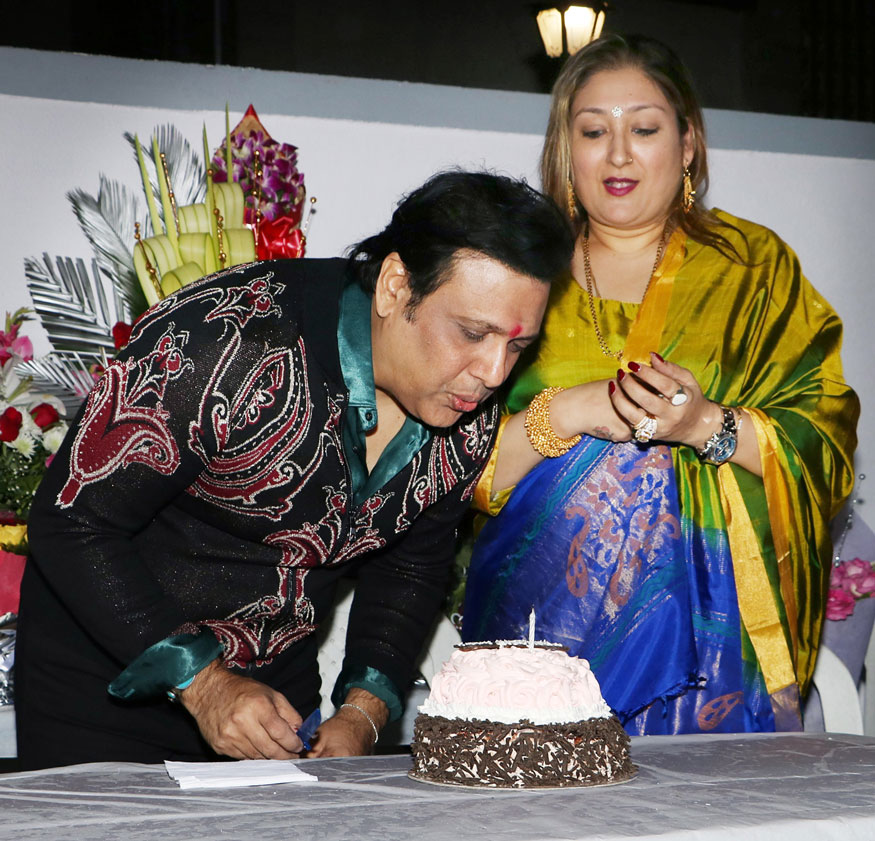 Govinda celebrate his birthday with wife Sunita Ahuja in Mumbai on Dec 21, 2017. Govinda,Govinda birthday,Govinda birthday celebration,Govinda birthday celebration with Media,Govinda birthday celebration pics,Govinda birthday celebration images,Govinda birthday celebration stills,Govinda birthday celebration pictures,Govinda birthday