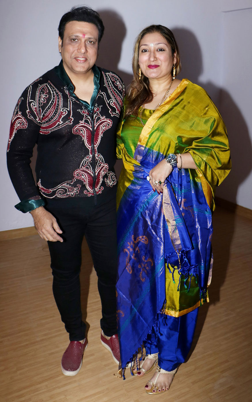Govinda and Sunita Ahuja pose together during party with media in Mumbai. Govinda,Govinda birthday,Govinda birthday celebration,Govinda birthday celebration with Media,Govinda birthday celebration pics,Govinda birthday celebration images,Govinda birthday celebration stills,Govinda birthday celebration pictures,Govinda birthday