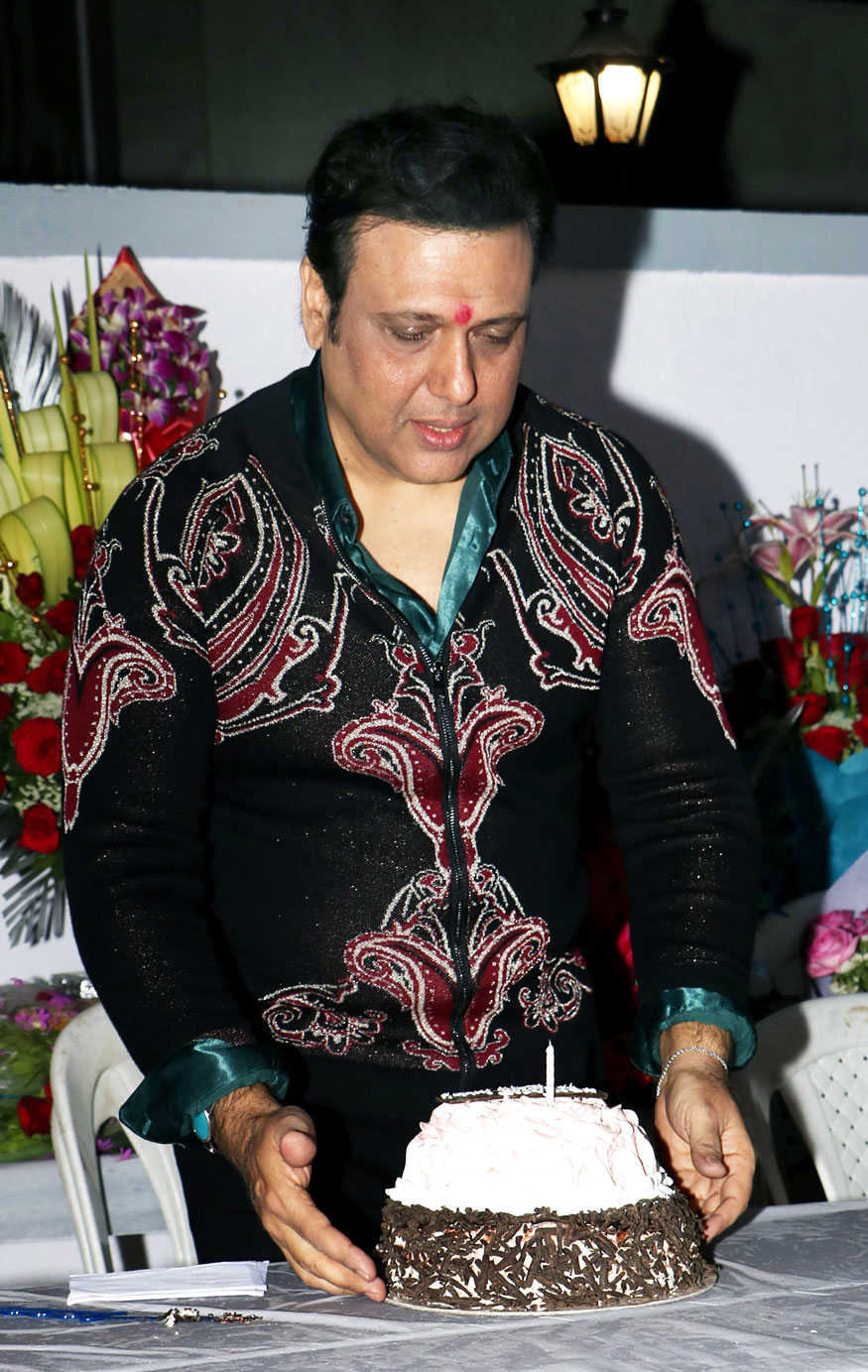 Bollywood actor Govinda celebrates his 54th birthday in Mumbai. Govinda,Govinda birthday,Govinda birthday celebration,Govinda birthday celebration with Media,Govinda birthday celebration pics,Govinda birthday celebration images,Govinda birthday celebration stills,Govinda birthday celebration pictures,Govinda birthday