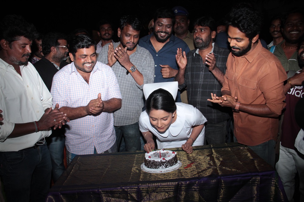 Actress Mahima Nambiar celebrates birthday with GV Prakash Kumar on Ayngaran movie sets. Mahima Nambiar,Mahima Nambiar birthday celebration,Mahima Nambiar birthday celebration pics,Mahima Nambiar birthday celebration images,GV Prakash Kumar,Ayngaran,Ayngaran on the sets
