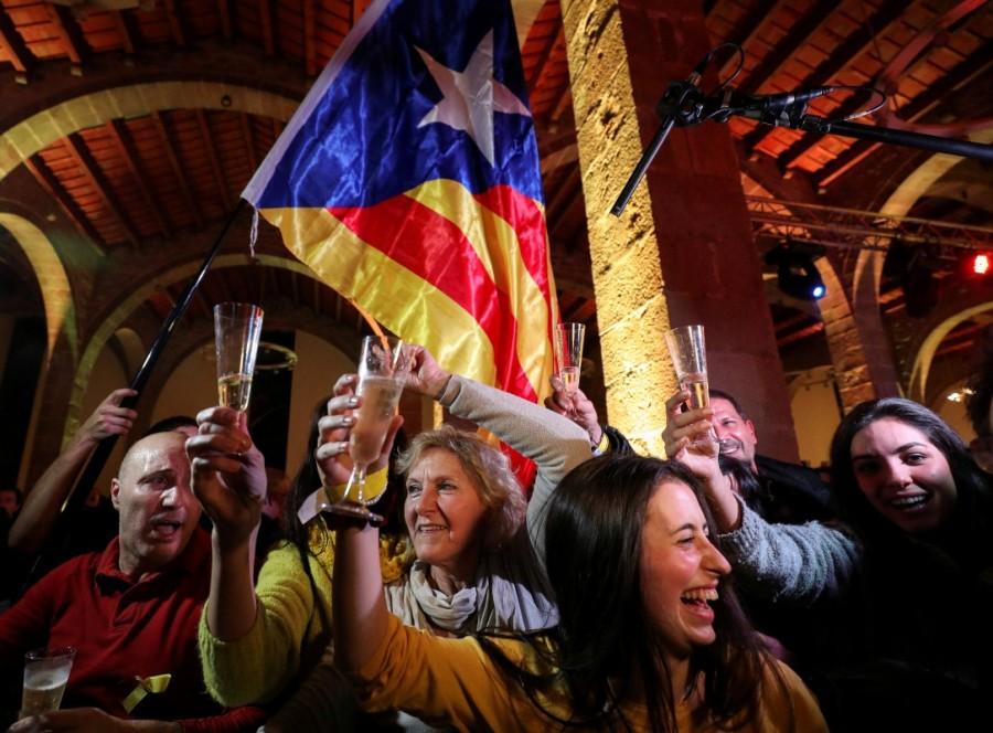 People react to results in Catalonia's regional elections at a gathering of the Catalan National Assembly (ANC) in Barcelona, Spain December 21, 2017. Catalan separatists win vote,Catalan separatists,Spanish Prime Minister Mariano Rajoy,Mariano Rajoy
