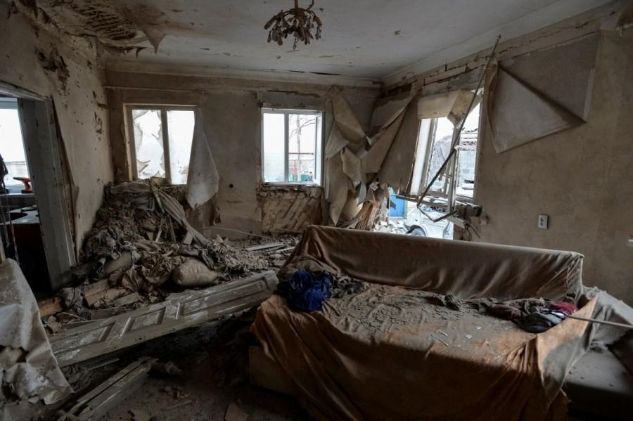 A house which was damaged by recent shelling is seen in the government-held village of Novoluhanske, Ukraine, December 19, 2017. Ukraine,Ukraine winter