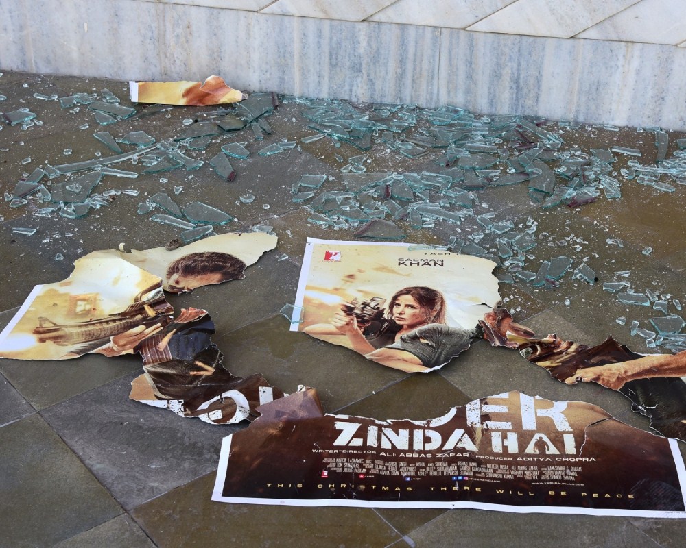 Shards of glass strewn on the floor along with torn poster of Salman Khan-Katrina Kaif starrer film "Tiger Zinda Hai" at a cinema hall in Bikaner on Dec 22, 2017. Rajasthan saw massive protests against the film with members of the Valmiki community disrupting the morning shows of "Tiger Zinda Hai"in many cinema halls across the state in protest against the alleged use of a pejorative word by Salman during a promotional event. Valmiki community protests,Salman Khan,Tiger Zinda Hai,Tiger Zinda Hai protests