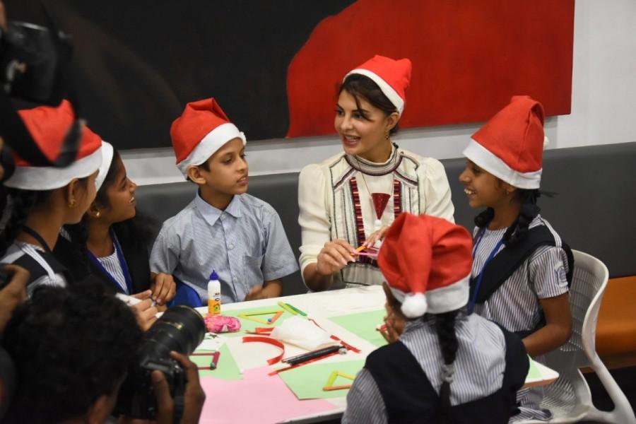 Jacqueline posted a few pictures on her Instagram from the NGO visit and expressed her joy to celebrate Christmas with the NGO kids. She further added "thanks for being my home away from home today" Jacqueline Fernandez,actress Jacqueline Fernandez,Jacqueline Fernandez Christmas celebration,Jacqueline Fernandez Christmas with NGO kids,Race 3 actress
