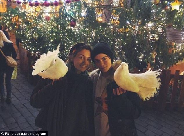 Prince wears a hooded black sweatshirt with a pair of dark blue jeans, while Blanket sports a grey shirt with a Marvel graphic with black shorts. Paris Jackson,Paris Jackson celebrates holiday,Paris Jackson celebrates christmas,Paris Jackson bikini snaps,Paris Jackson bikini pics,Paris Jackson bikini images,Paris Jackson bikini stills,Paris Jackson bikini pictures