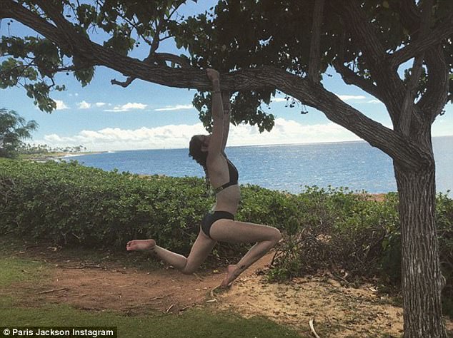 In another post, she hinted that she might be vacationing on one of the Hawaiian islands, as she was seated outdoors with others playing the guitar. Paris Jackson,Paris Jackson celebrates holiday,Paris Jackson celebrates christmas,Paris Jackson bikini snaps,Paris Jackson bikini pics,Paris Jackson bikini images,Paris Jackson bikini stills,Paris Jackson bikini pictures