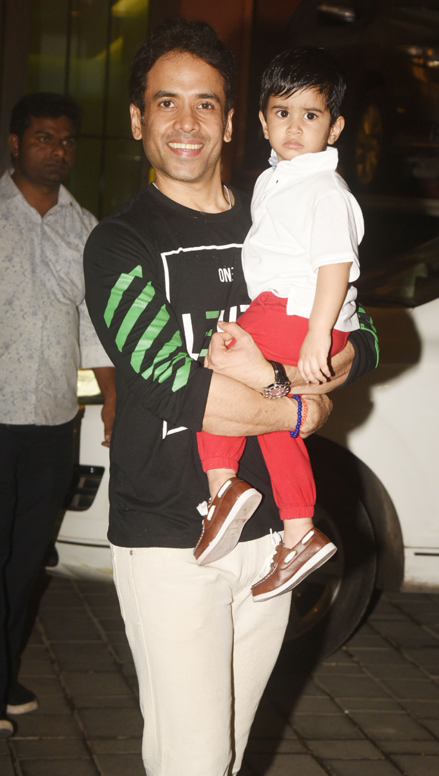 Tusshar Kapoor with his son Laksshya Kapoor at Arpita Khan's Christmas Party. Salman Khan,Iulia Vantur,Katrina Kaif,Karan Johar,Soha Ali Khan,Aayush Sharma,Arpita Khan Christmas Party,celebs at Arpita Khan Christmas Party,Arpita Khan Christmas Party pics,Arpita Khan Christmas Party images,Arpita Khan Christmas Party stills,Arpita K