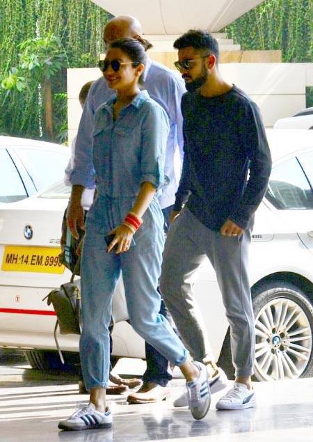 Bollywood Actress Anushka Sharma and Cricket player Virat Kohli arrives at St Regis hotel in Mumbai today for their wedding reception this evening. Anushka Sharma and Virat Kohli,Anushka Sharma and Virat Kohli wedding reception,Anushka Sharma and Virat Kohli reception,Anushka Sharma reception,Virat Kohli reception