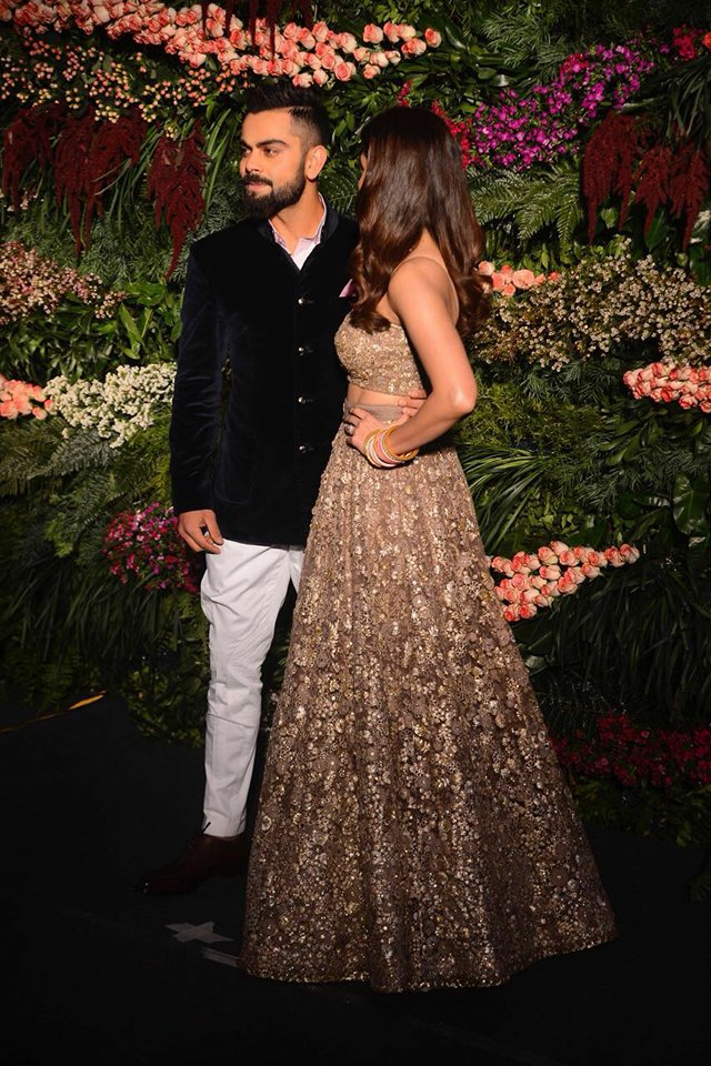 At the reception at St Regis' Astor Ballroom, the sports world was represented by Chief selector Sandeep Patil, Saina Nehwal, Ravindra Jadeja, M.S. Dhoni, Rohit Sharma, Virender Sehwag, Sunil Gavaskar, Sachin Tendulkar, Hardik Pandya, Zaheer Khan, Jaydev Unadkat, Cheteshwar Pujara, Umesh Yadav and many more, while Bollywood bigwigs such as Rekha, Madhuri Dixit Nene, Kangana Ranaut, Prasoon Joshi, Anurag Kashyap, Lara Dutta, Ramesh Taurani, Aditya Roy Kapur, Sidharth Roy Kapur, Vidhu Vinod Chopra, Boman Irani, Rajkumar Hirani, newbie Sara Ali Khan and Ibrahim Ali Khan, Dino Morea, Music Maestro A.R. Rahman were present. Virat Kohli and Anushka Sharma,Virat Kohli and Anushka Sharma Mumbai reception,Virat Kohli and Anushka Sharma Mumbai reception pics,Virat Kohli and Anushka Sharma Mumbai reception images,Virat Kohli,Anushka Sharma