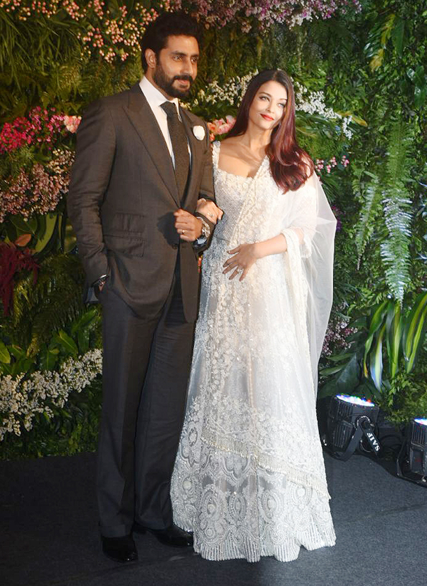 Abhishek Bachchan and Aishwarya Rai Bachchan attend the wedding reception of Virat Kohli and Anushka Sharma held at St. Regis Hotel in Mumbai on December 26, 2017. Amitabh Bachchan,Abhishek,Aishwarya Rai,Lara Dutta,Mahesh Bhupathi,Virat Kohli and Anushka Sharma reception