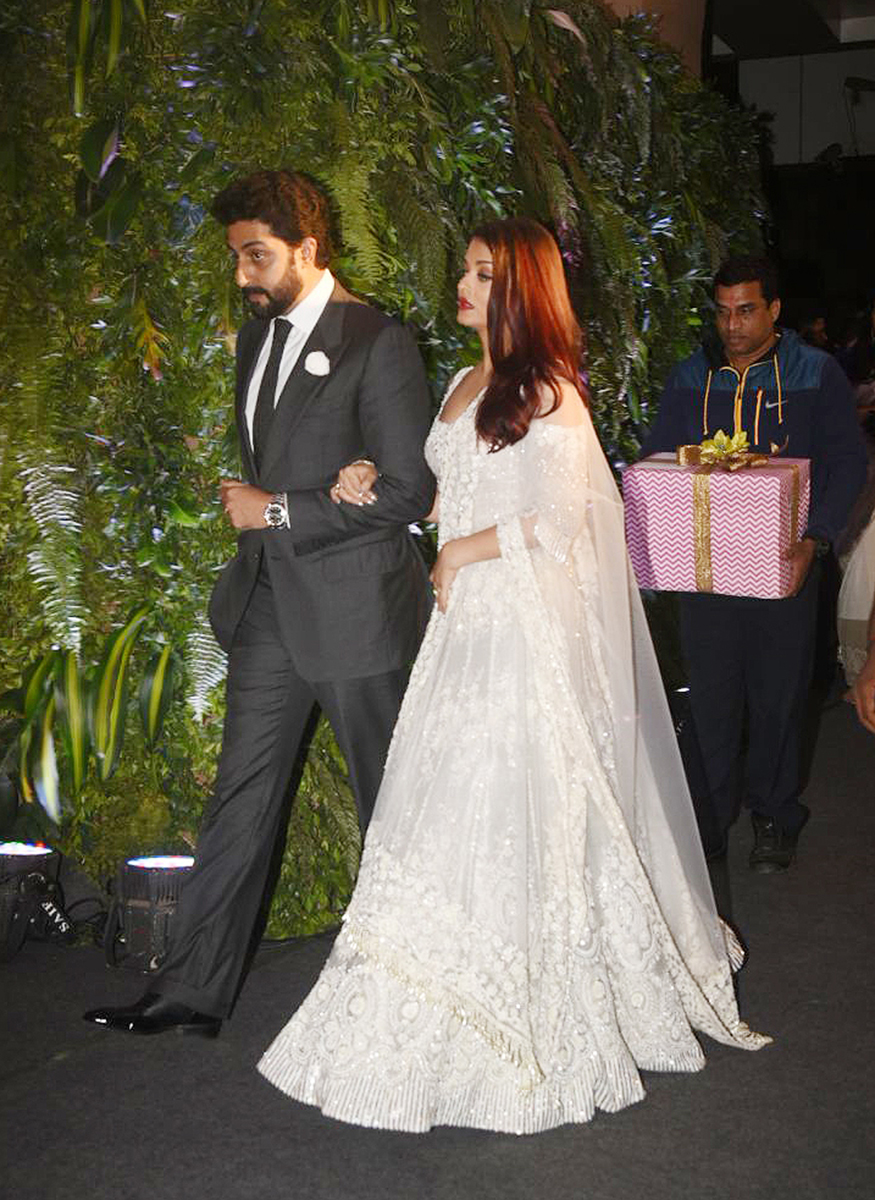 Abhishek Bachchan and Aishwarya Rai Bachchan attend the wedding reception of Virat Kohli and Anushka Sharma held at St. Regis Hotel in Mumbai on December 26, 2017. Amitabh Bachchan,Abhishek,Aishwarya Rai,Lara Dutta,Mahesh Bhupathi,Virat Kohli and Anushka Sharma reception