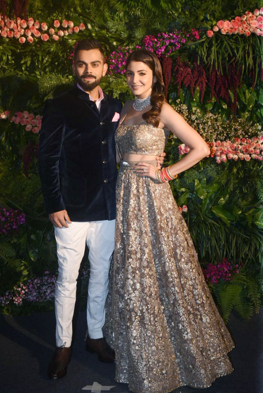 Virat Kohli and Anushka Sharma pose together during their wedding reception. Priyanka Chopra,Shah Rukh Khan,Ranbir Kapoor,Virat Kohli and Anushka Sharma reception,Virat Kohli reception,Anushka Sharma reception,Virat Kohli and Anushka Sharma mumbai reception,Virat Kohli,Anushka Sharma