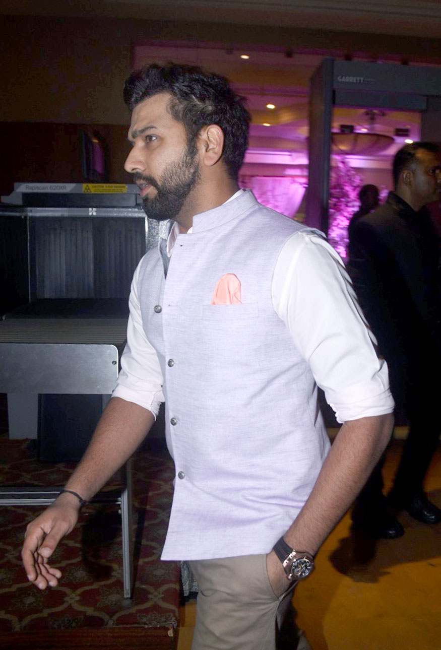Rohit Sharma arrives for the wedding reception of Krunal Pandya and Pankhuri Sharma held at JW Marriott hotel in Mumbai on December 27, 2017. Amitabh Bachchan,Rohit Sharma,Irfan Pathan,Hardik Pandya,Elli AvrRam,Krunal Pandya and Pankhuri Sharma,Krunal Pandya and Pankhuri Sharma wedding reception,Krunal Pandya and Pankhuri Sharma reception,Krunal Pandya wedding reception,Pankhuri Sharma wedding