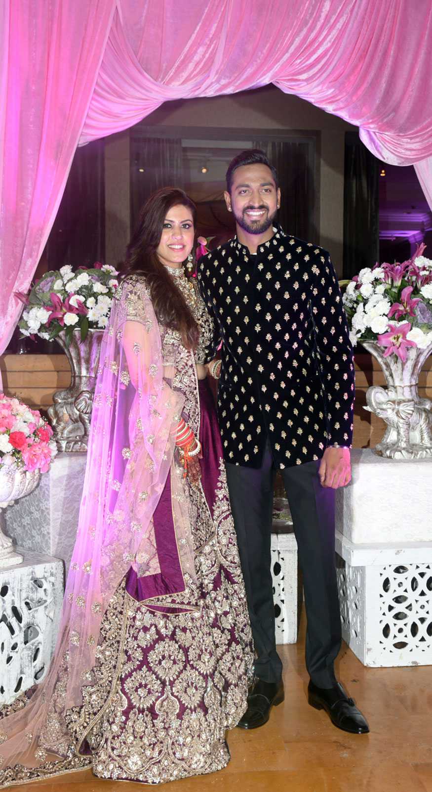 Krunal Pandya and Pankhuri Sharma's wedding reception pics. Amitabh Bachchan,Rohit Sharma,Irfan Pathan,Hardik Pandya,Elli AvrRam,Krunal Pandya and Pankhuri Sharma,Krunal Pandya and Pankhuri Sharma wedding reception,Krunal Pandya and Pankhuri Sharma reception,Krunal Pandya wedding reception,Pankhuri Sharma wedding