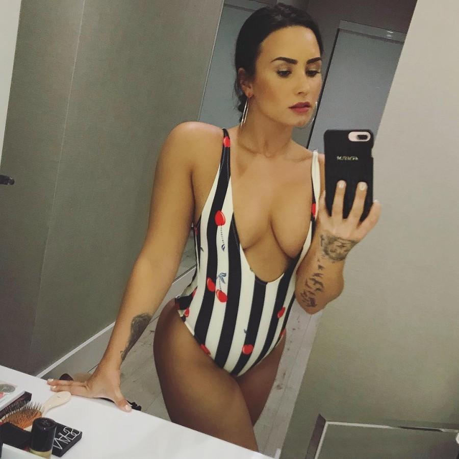 Singer Demi Lovato showcased flaunted ample cleavage as well as toned legs and arms in a daring swimsuit. She teased her 63 million Instagram followers with the selfie on Wednesday, reports mirror.co.uk. Alongside the image, the singer said she is "In love with this bathing suit". Singer Demi Lovato,Demi Lovato,Demi Lovato flashes cleavage,Demi Lovato cleavage,Demi Lovato hot cleavage,Demi Lovato hot pics,Demi Lovato hot images,Demi Lovato hot stills,Demi Lovato hot pictures,Demi Lovato hot photos