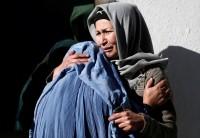 Afghan women mourn inside a hospital compound after a suicide attack in Kabul, Afghanistan December 28, 2017. Suicide bombers stormed a Shi'ite cultural centre and news agency in the Afghan capital on Thursday, killing more than 40 people and wounding scores, many of them students attending a conference.